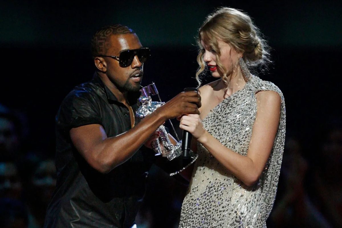 Kanye West notoriously grabs the microphone from Taylor Swift at the VMAs in 2009 as she accepts the "Best Female Video" award during the MTV Video Music Awards.