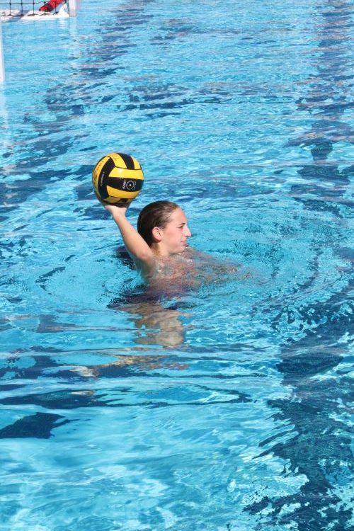 Junior Thalea Charton passes the ball during an after-school practice.