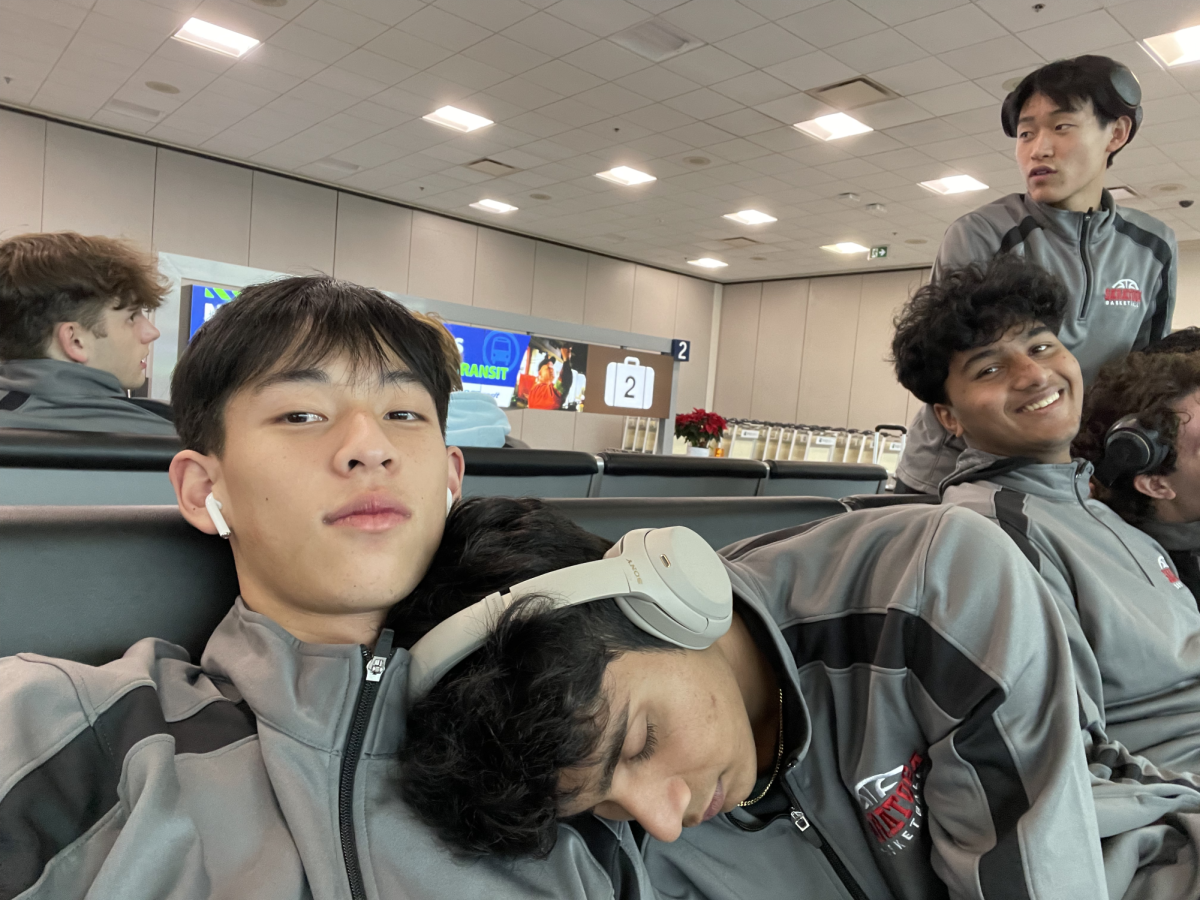 Saratoga basketball team enjoying a nice nap at the airport