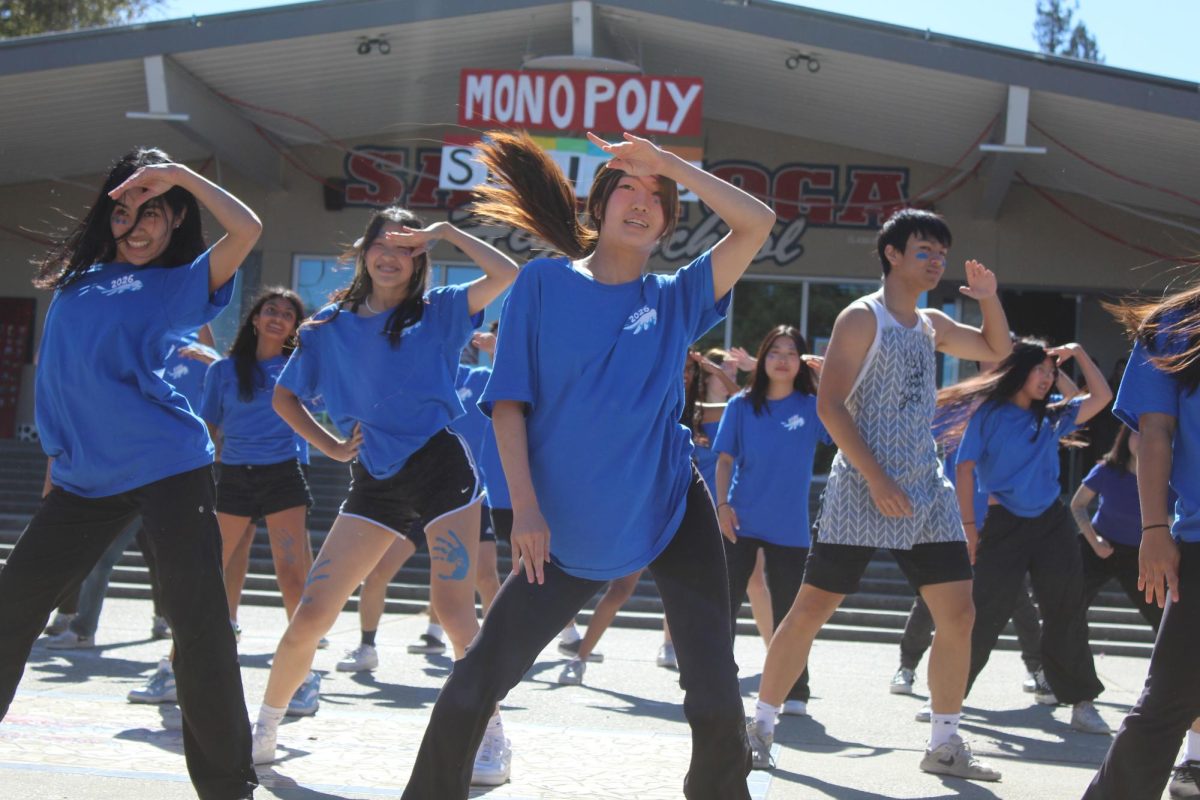 Group dance carries the show with energetic dance moves and smiles on their faces. 