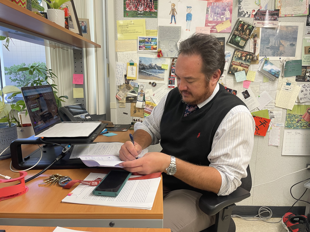 Rector hard at work grading essays as the end of the six week grading period quickly approaches.