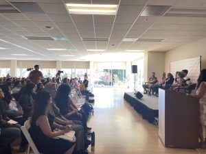 Mothers of middle and high school students from across the Bay Area listen to MomsConnect 2024 panelists on Sept. 22.