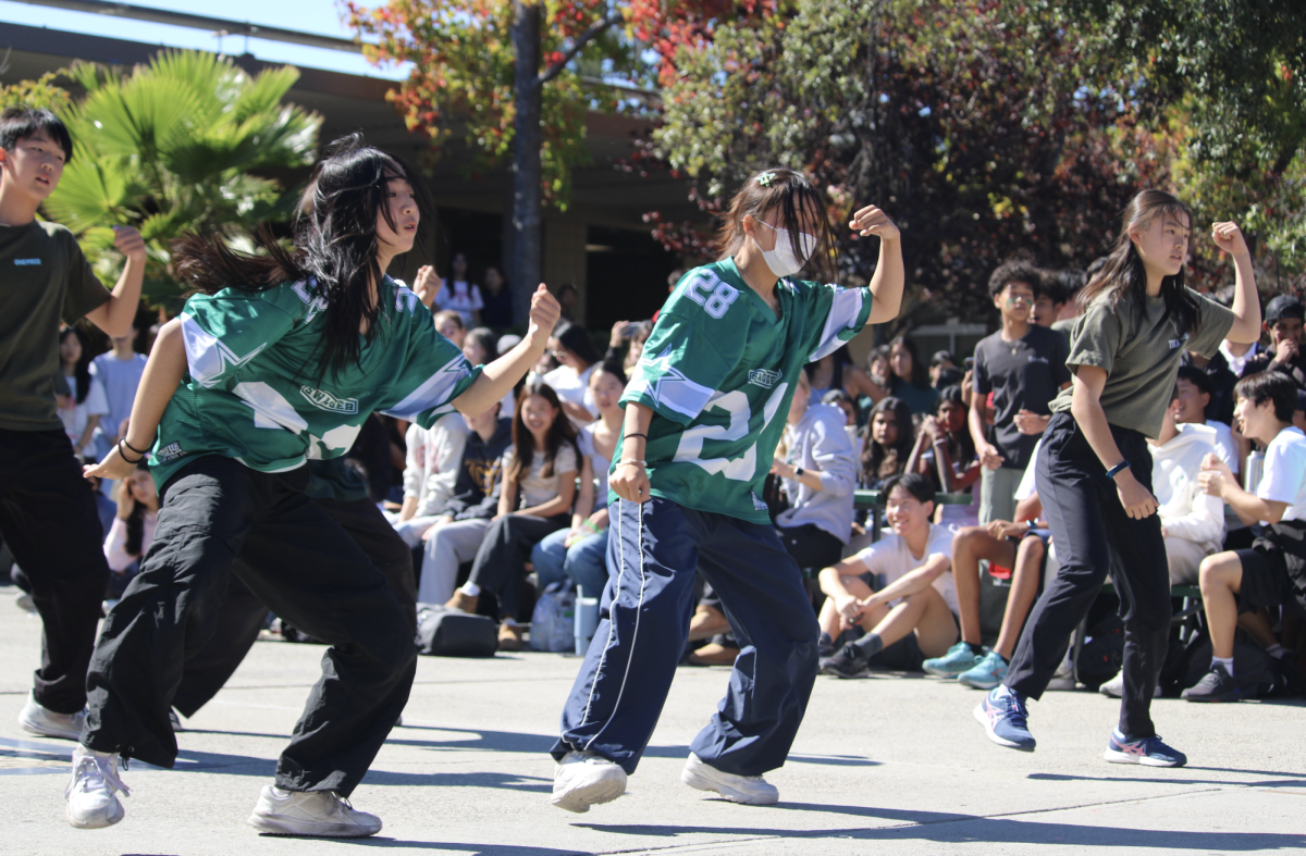 Sporting green jerseys, Joseph Yu, Elaine Luo, Sophie Qi and Serena Hu went all out for their performance.