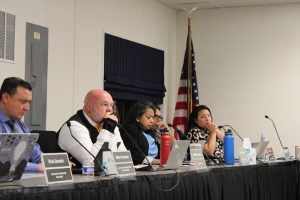 Assistant superintendent of business services Ruben Fernandez, superintendent Bill Sanderson, director of human resources Dagmar Derickson, assistant superintendent of student services Heath Rocha and public information officer Tanya De La Cruz listen to public comment against the amendments to Sanderson’s contract. The new contract was approved by the board in a unanimous decision.