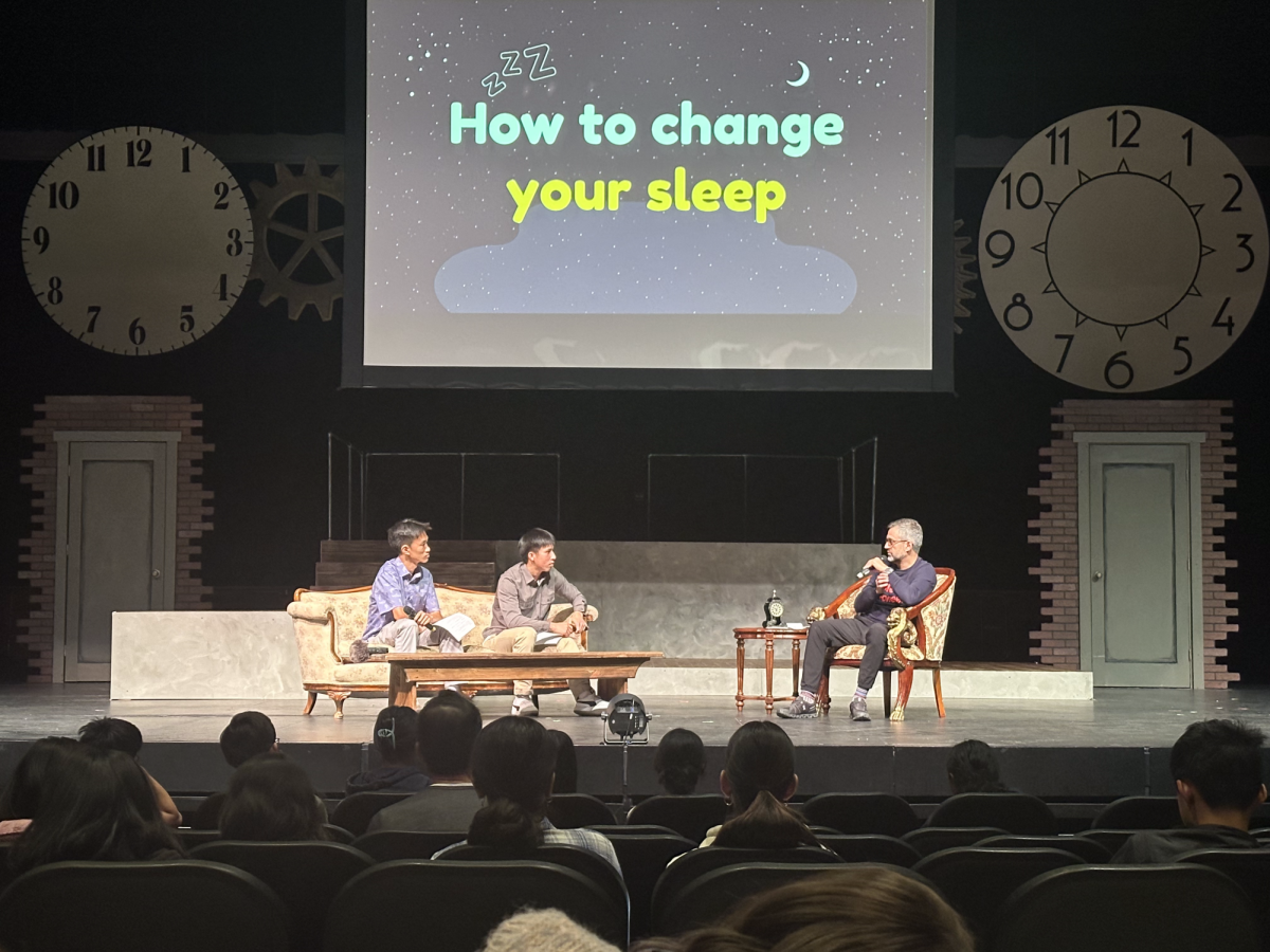 Juniors Jack Dong and Nathan Liu (left to right) interview Dr. Tony Masri about sleep. 
