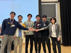 Saratoga Team 1, senior Alan Lu, junior Lawson Wang, sophomores Andy Lu and Seabert Mao, senior Skyler Mao and sophomore Vivian Zhong (left to right), hold their 3rd place trophy.