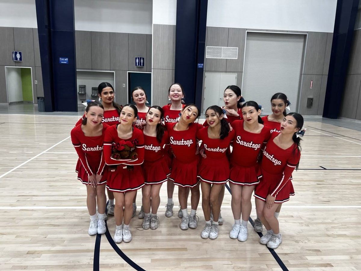 The cheer team poses for a photo together at the JAMZ competition on Nov. 9.
