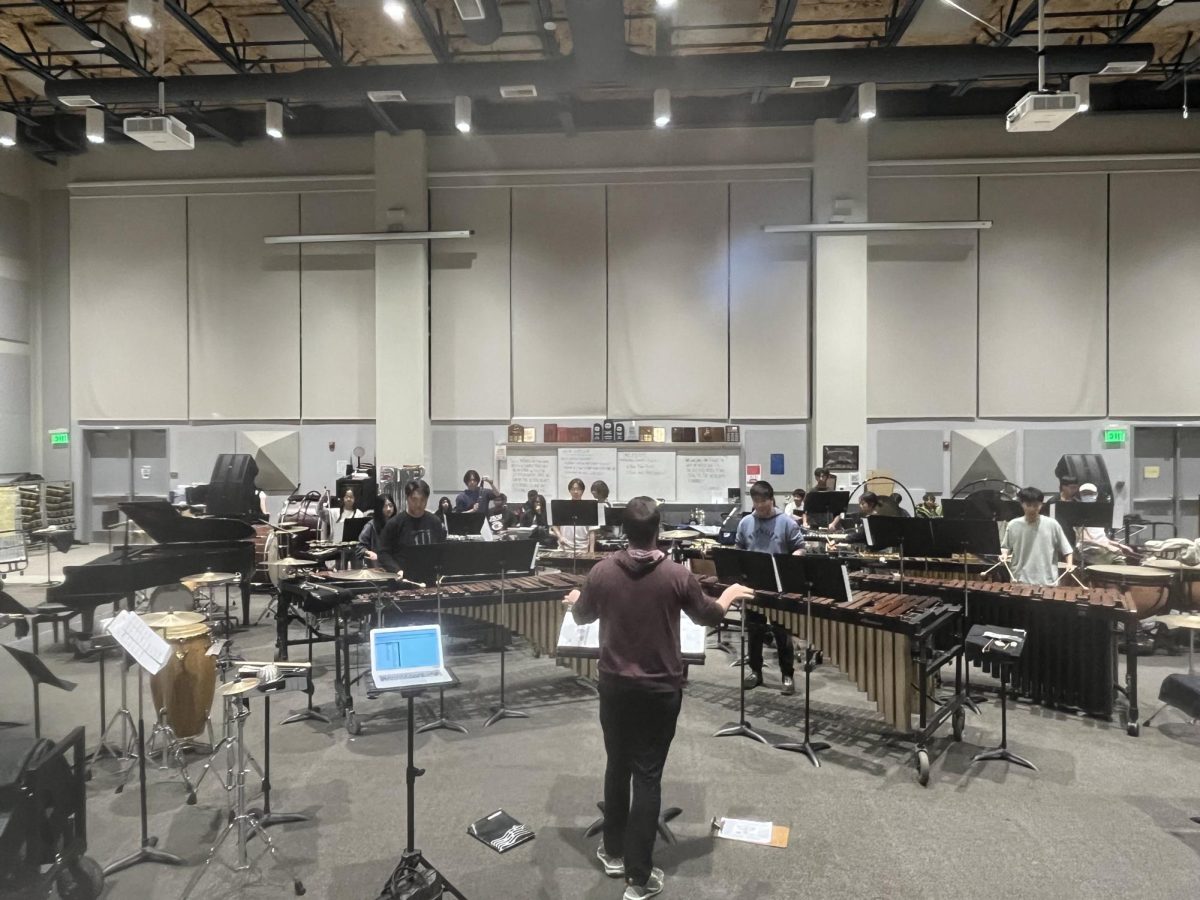 On Nov. 18 at the m101, the percussion students rehearse from 5:30-7:30 p.m. under the instruction of percussion director Sean Clark in preparation for their preview concert and the Midwest Clinic.