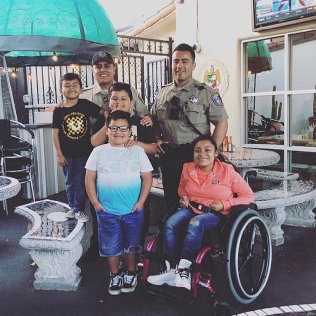 Deputy Perez and Deputy Nicolas Galvez engage with their community.