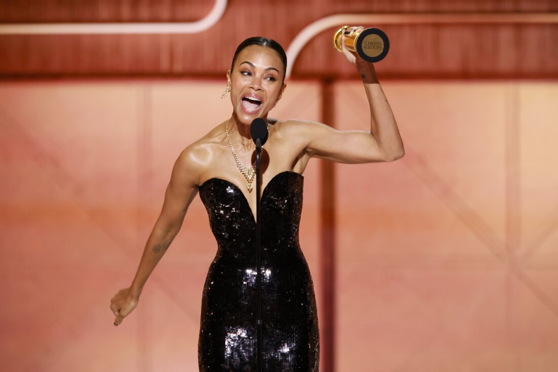 Zoe Saldana accepts the award for “Best Performance by a Female Actor in a Supporting Role in any Motion Picture” for her work in “Emilia Perez.”