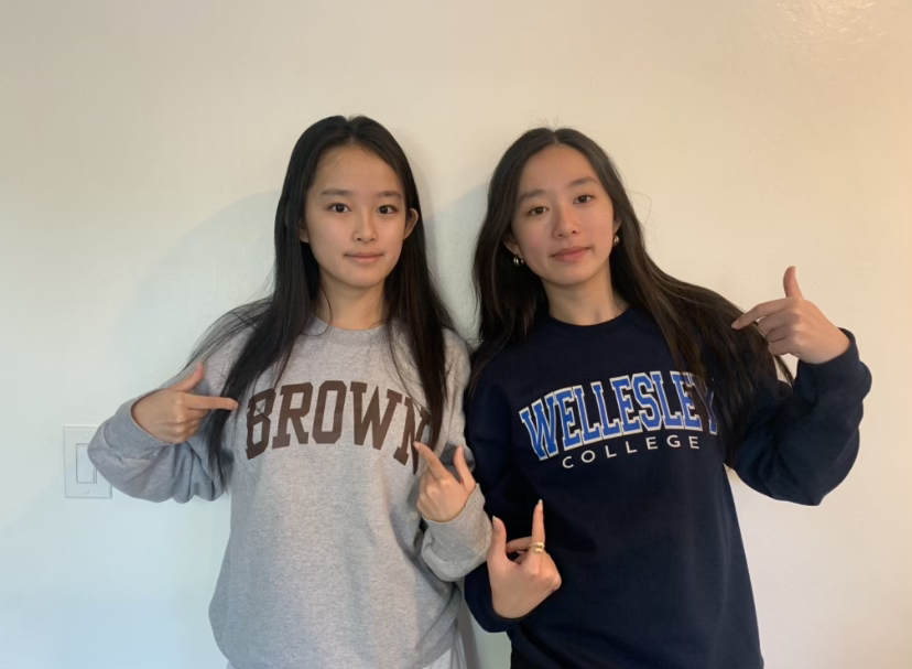 Vera and Emma Fung posing with their schools.