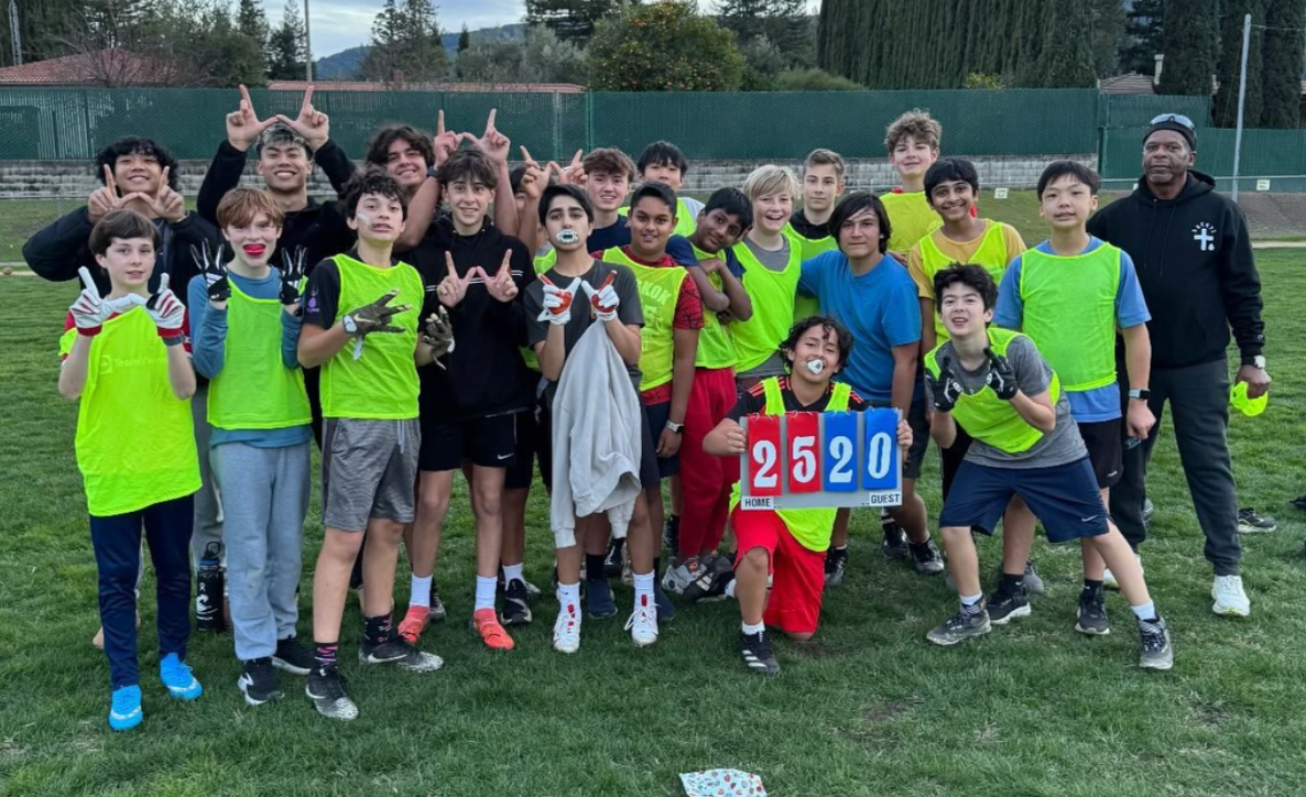 On Jan. 7, Redwood’s JV flag football team celebrates their win against Monroe Middle.