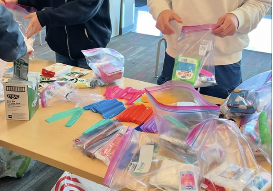 Students pack survival kits during the MLK Day of Service hosted by the IFA club. 