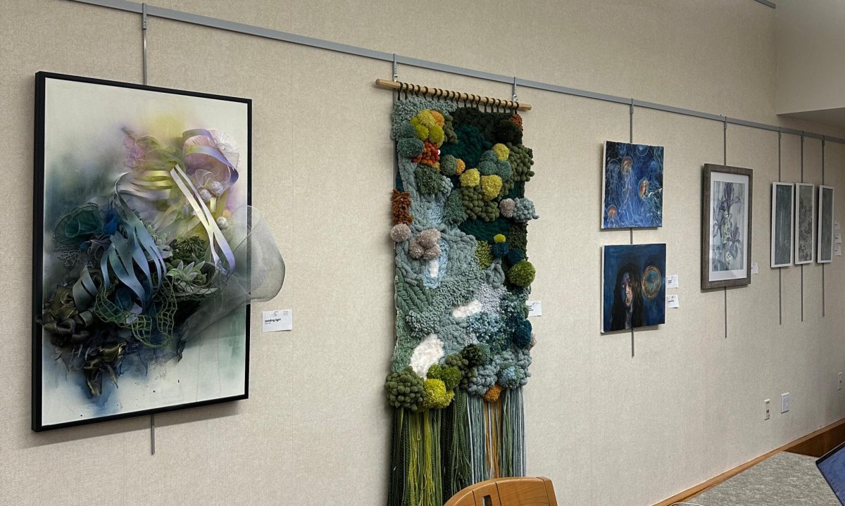 “Nature’s Chance Encounter” along with many others of senior Amy Pan’s paintings adorn the Saratoga Library Group Study Room.