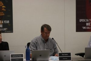 Ex-trustee Alex Shultz at a board meeting last October. The candidates are applying to fill the vacancy left by Shultz, who resigned in January for personal reasons.