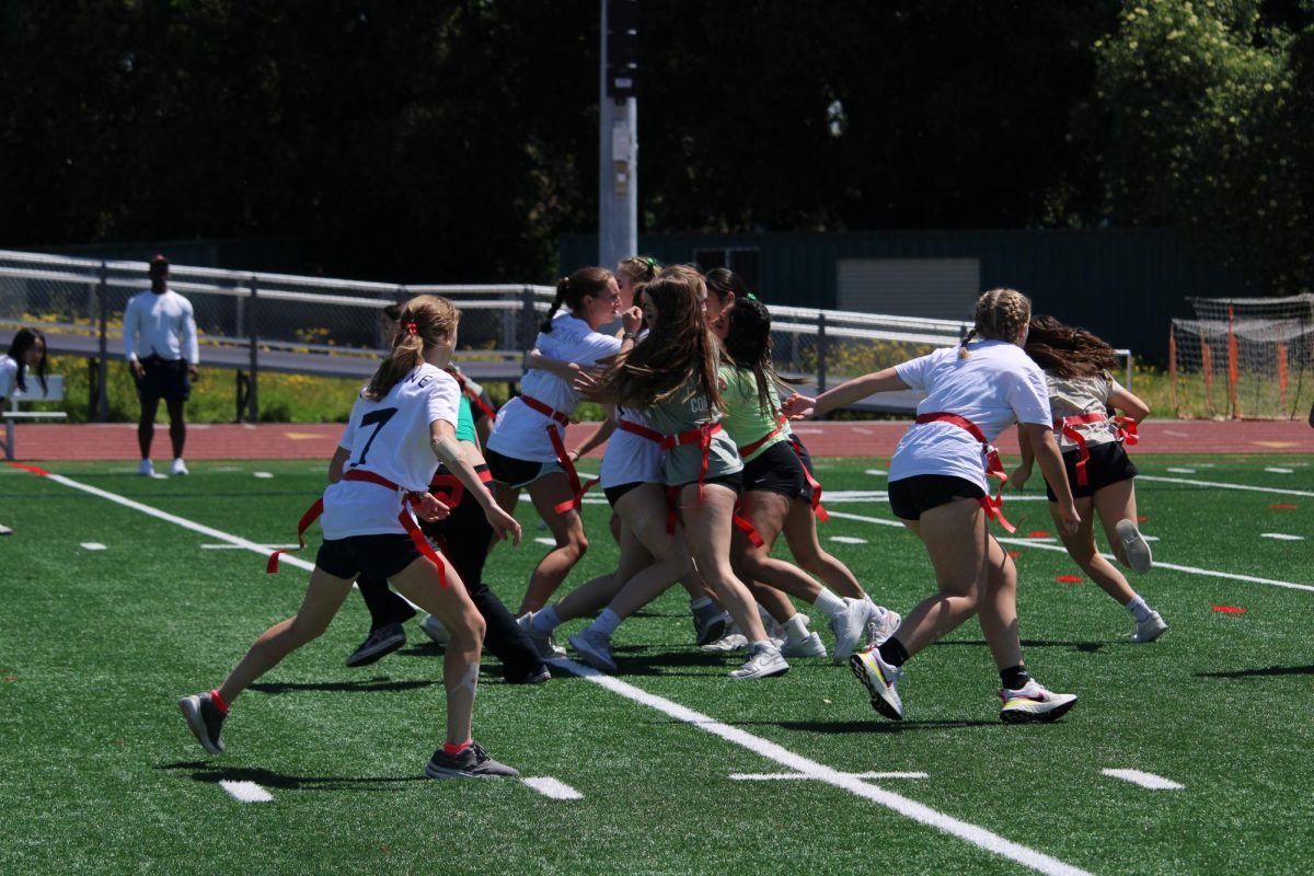 Students play girl’s flag football during the 2024 Falcon Puff competition.