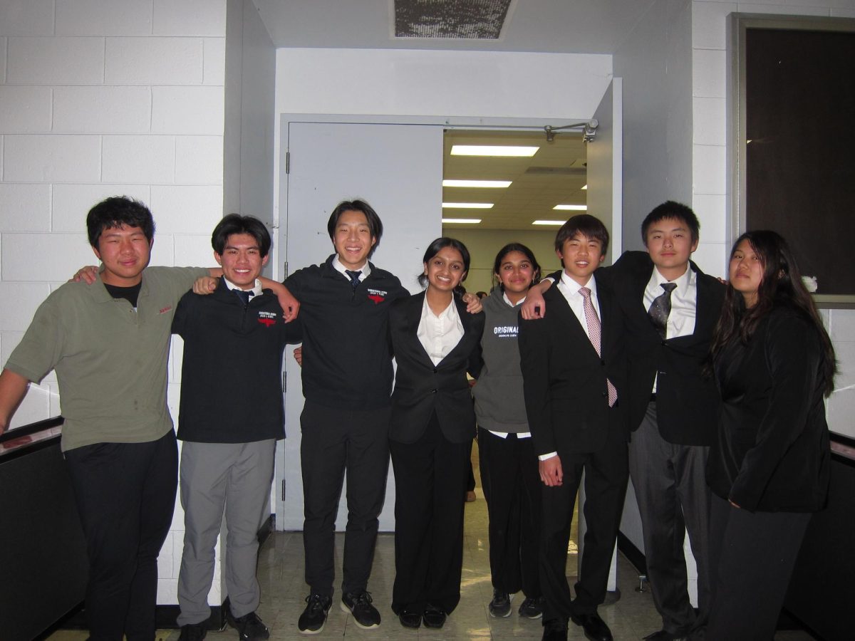 Members of the Saratoga debate team pose for a group picture during the James Logan Invitational.