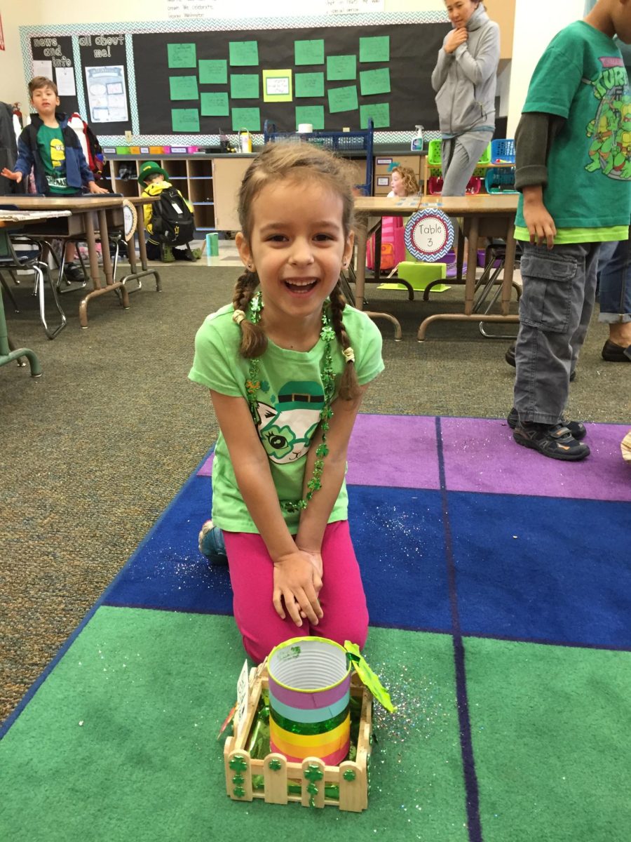 My kindergarten self shows off her amazing leprechaun trap she spent hours creating.