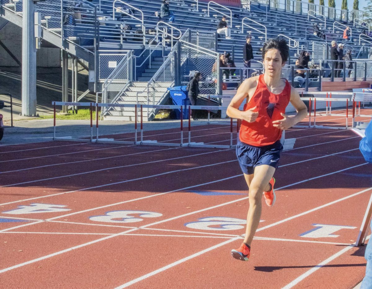 Senior captain Dylan Sordello runs the 3,200-meter event at the tri-meet on March 13.