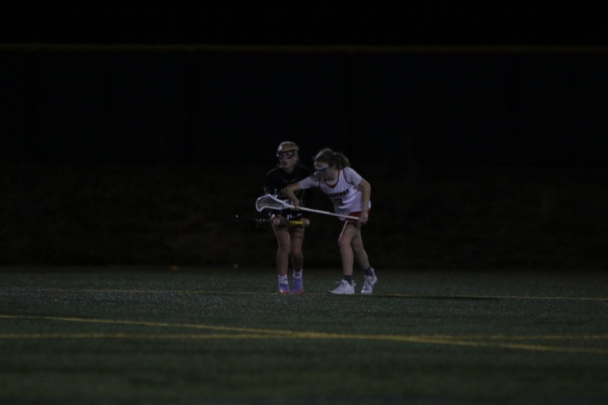 Junior Sophia Farone lines up for a face-off in last season’s match against Los Gatos.