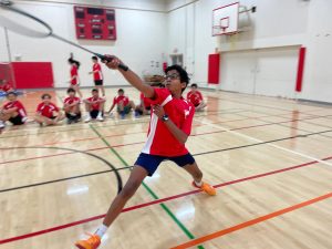 Freshman Aakarsh Ekollu attempting a net shot