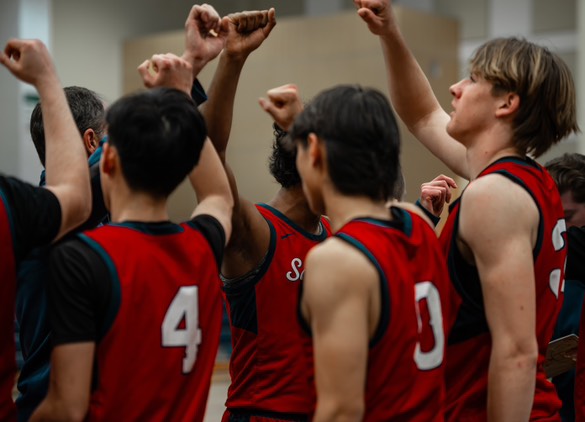 The team huddles during their CCS quarterfinals game against Sacred Heart Cathedral Preparatory
