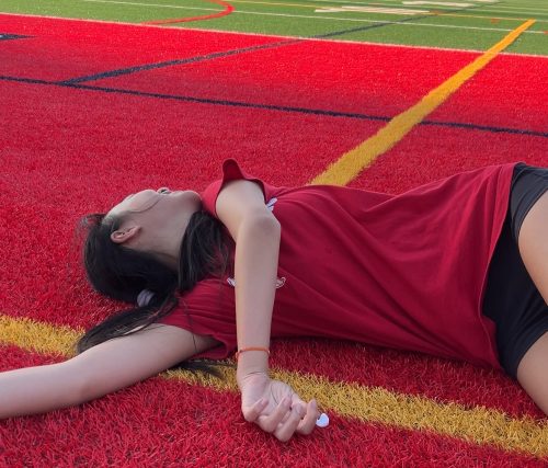 Grace collapses on the floor after “running” an almost 14-minute mile. 