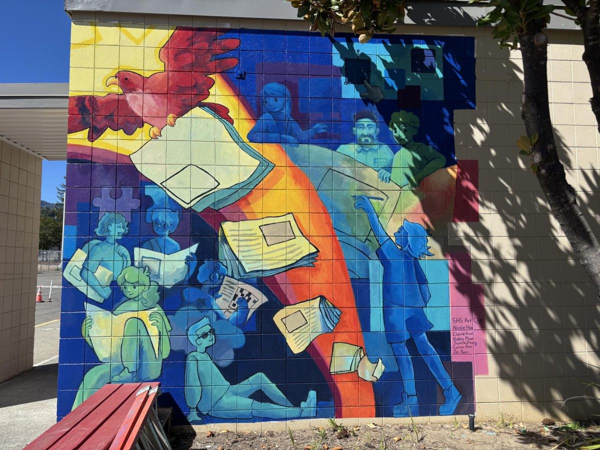 After months of hard work, the Falcon mural is proudly on display outside of Room 303.