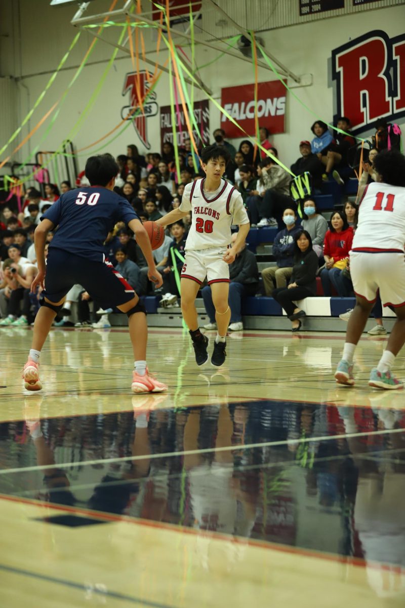  Courtesy of the Talisman
Junior Aidan Liu dribbles the ball in a match during last year’s season.
