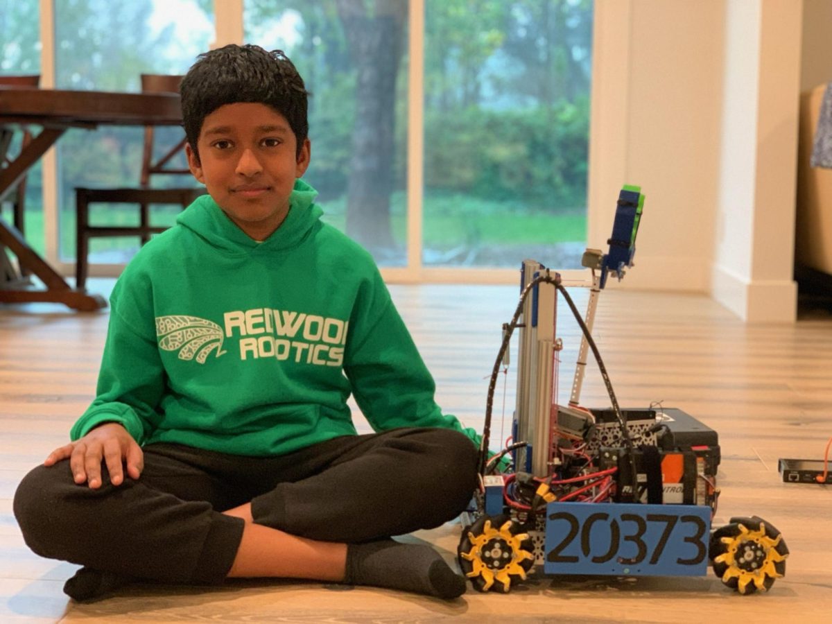 Vibhu Siddha with his robot from his sixth grade season.