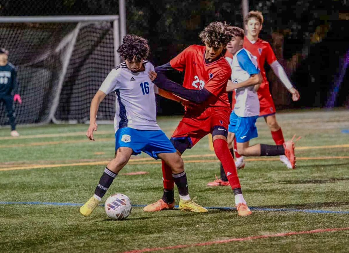 Hotha holds off one of Oak Grove High’s attackers. 