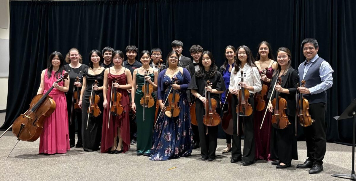 Student performers and Chamber Music by the Bay professionals line up for a final photo.