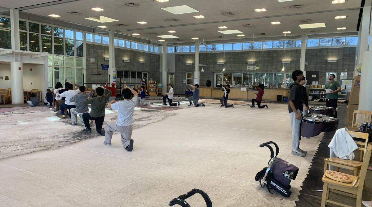 The battery and visual ensemble rehearse their show choreography. 