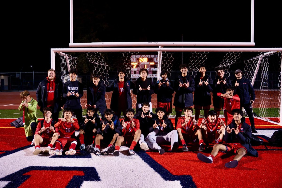 The team poses for a picture after securing their first league win of the season.