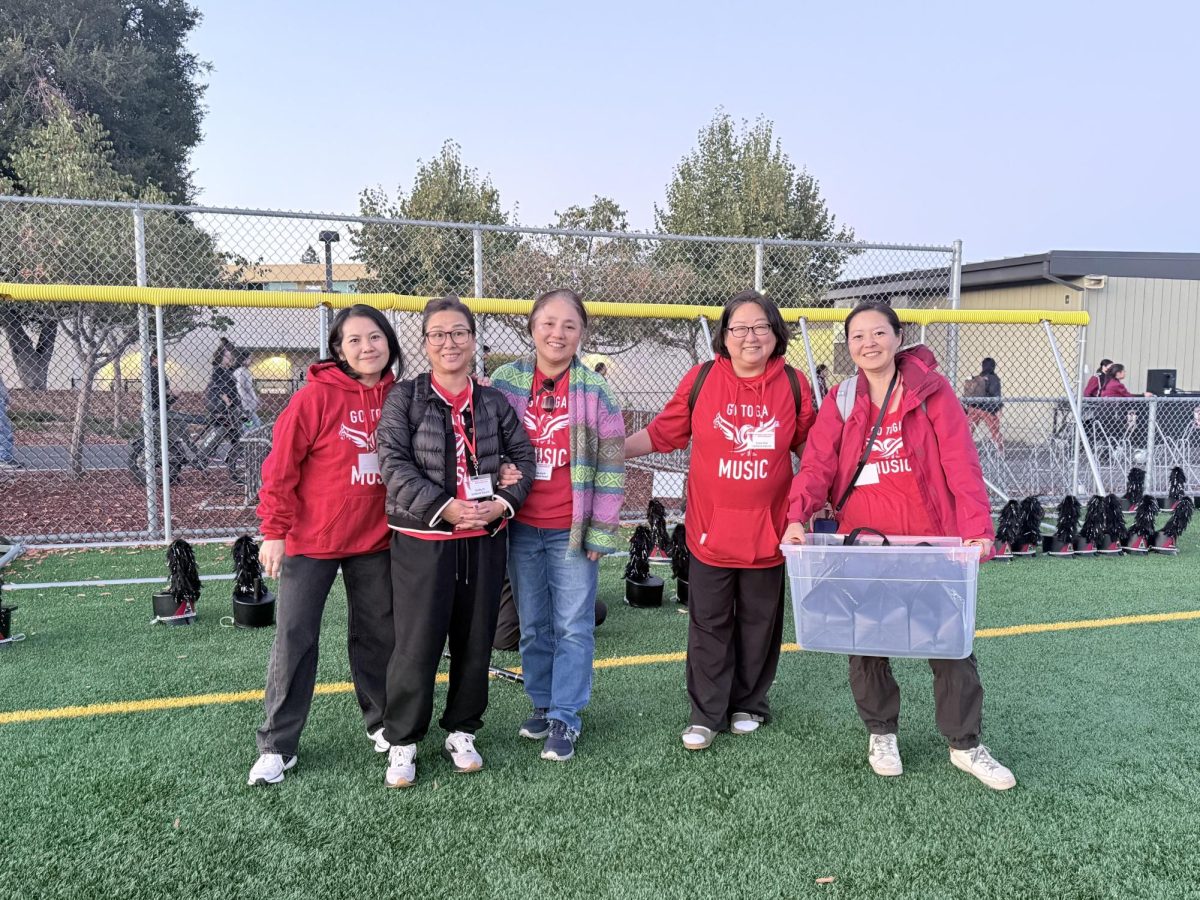  Courtesy of Beryl Liu

Marching band parent volunteers pose for a photo in recognition of their behind-the-scenes support. 