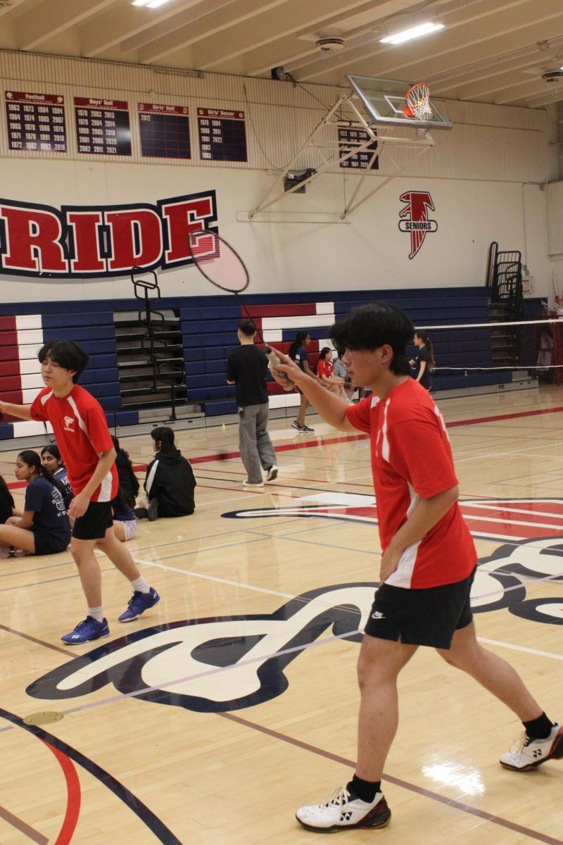 Aaron Su (11) and Sean Tsai (11) getting ready to receive a serve.