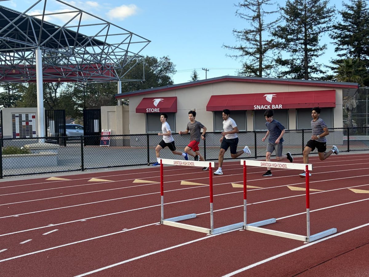  Courtesy of Alice Zheng
Sophomores Bryan Luo, Daniel Yeh, Farhaan Shikalgar, Bennett Strong and freshman Faiz Musani race down the track for their usual sprints warmup.