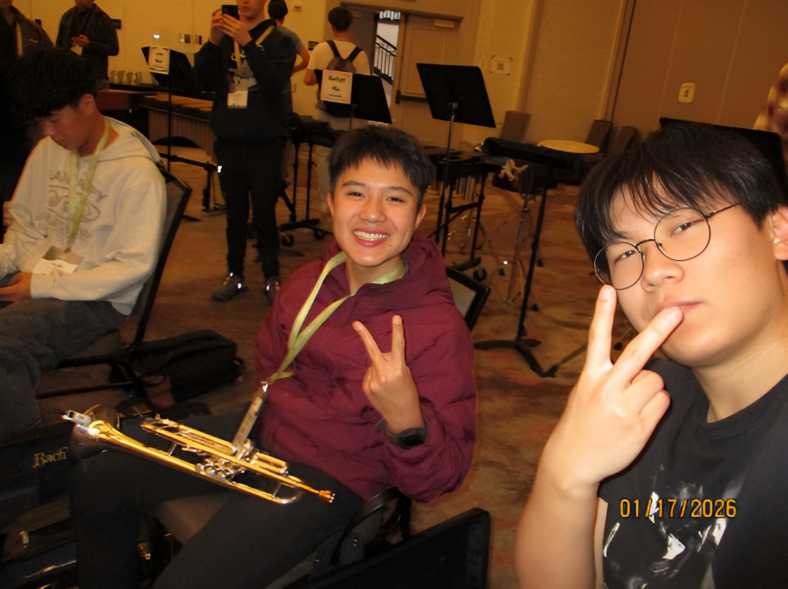  Courtesy of Brandon Chen
Chen taking a selfie with his stand partner at All State.