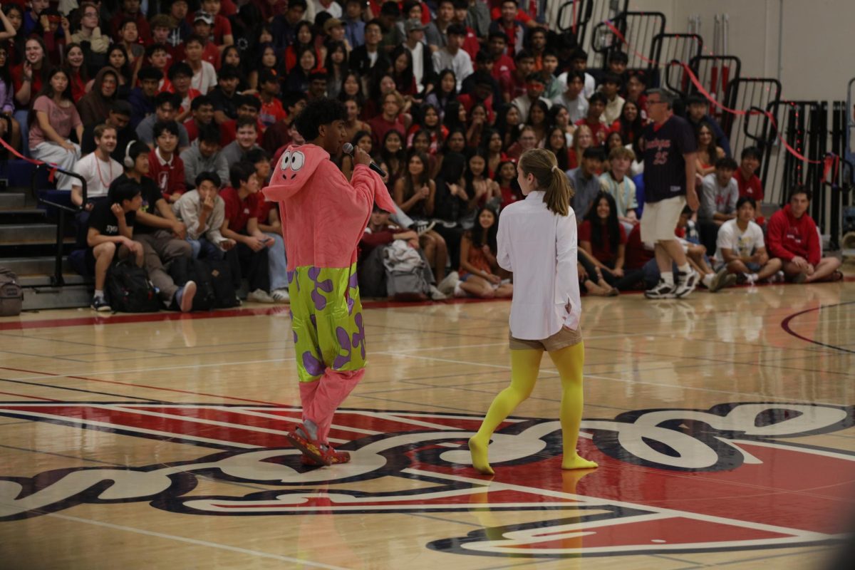 Senior Andrea Cordova and junior Zain Manohar broadcast in costumes.