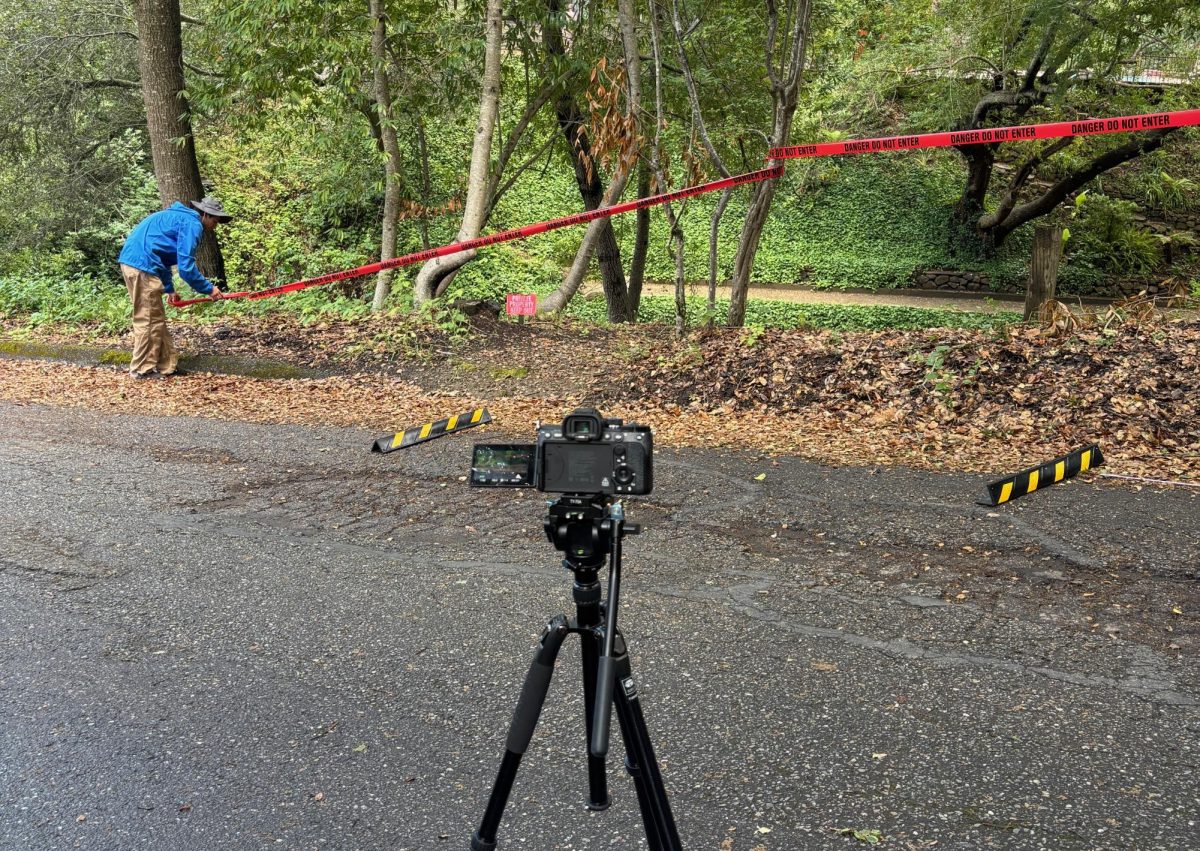 Senior producer Zack Thawer sets up a crime scene.