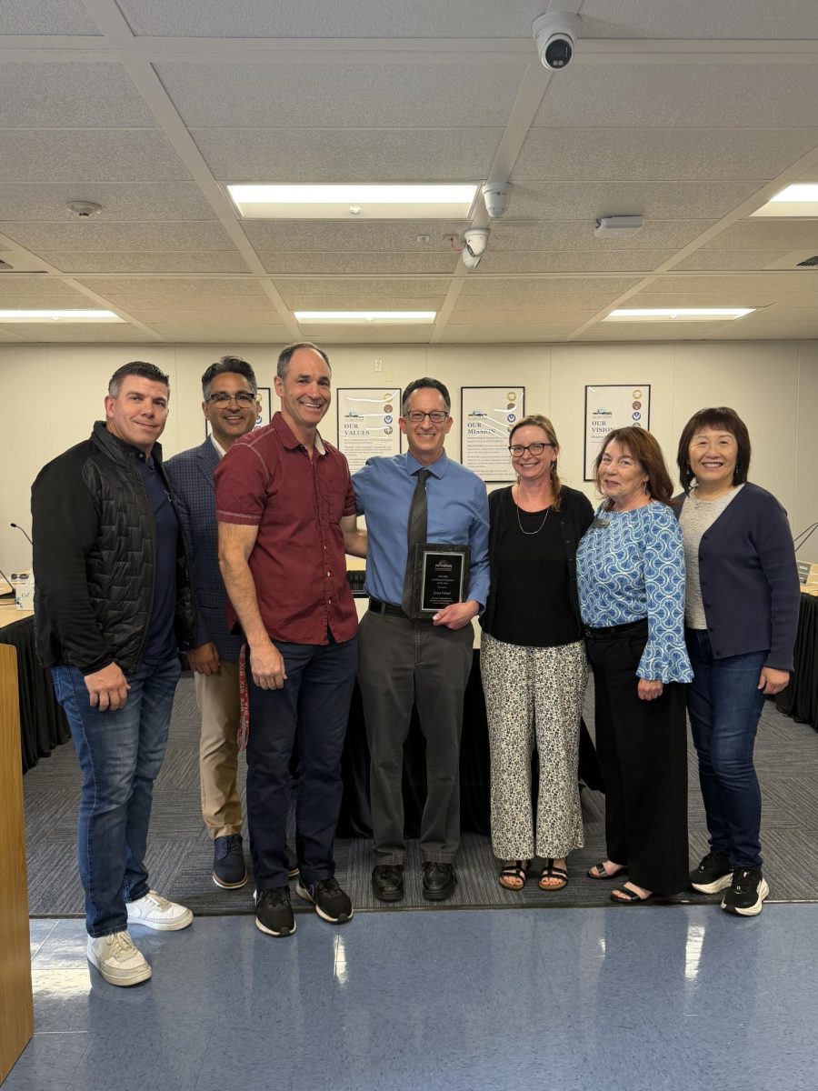  Courtesy of Tanya De La Cruz

English teacher Jason Friend receives recognition award from the board during an employee celebration ceremony held on May 28 at the district office. Pictured from left to right are board member Shawn Mortensen , superintendent Heath Rocha, history teacher Mike Davey, Friend, English teacher Natasha Ritchie, board member Theresa Bond and board member Katherine Tseng. 