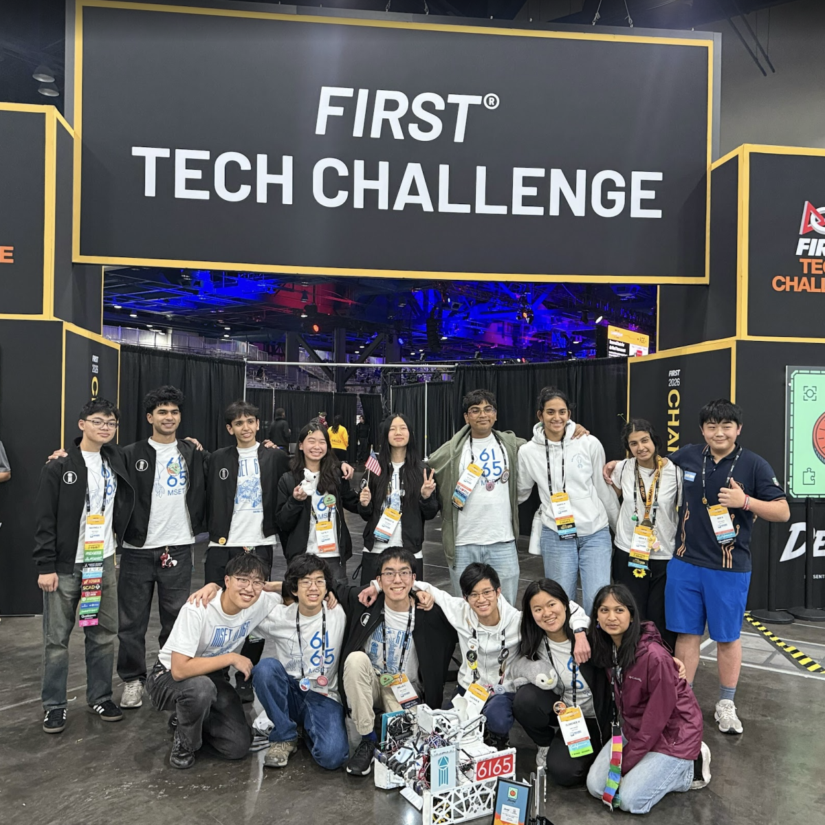  Courtesy of Anya Vora
The team poses in front of the entrance to the World Championship arena. 